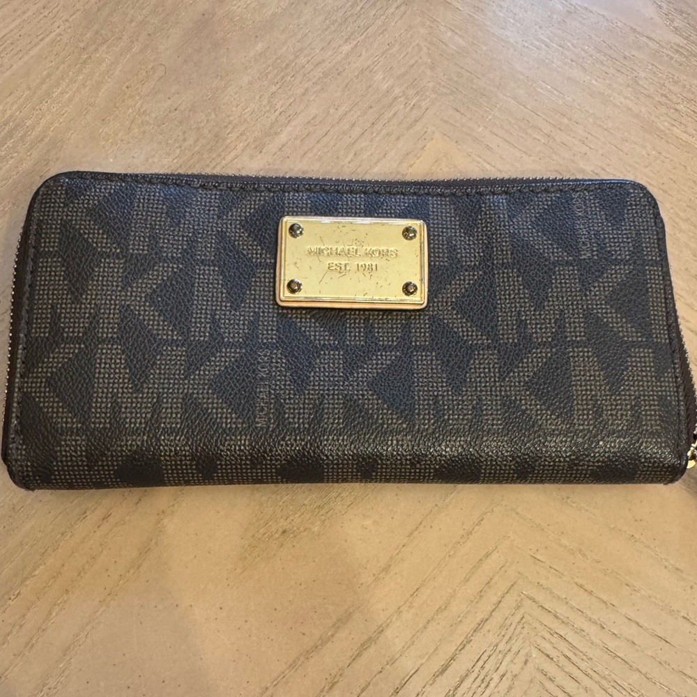 Michael Kors zip around wallet.